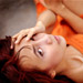 milla in orange sweater